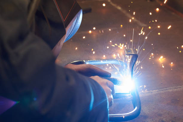 istock A man in a protective mask carries out welding work. 1193984224