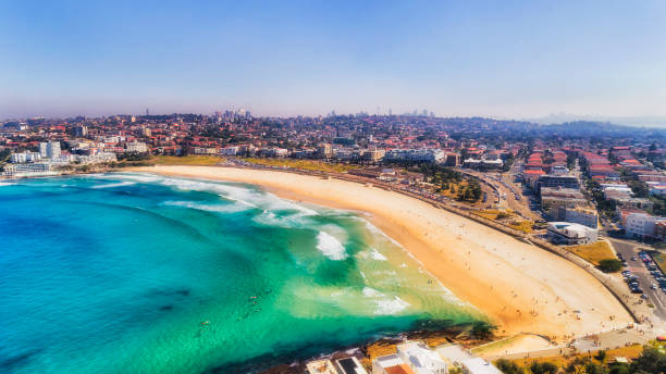D BOndi Day beach arch CBD Air contamination over Greater Sydney, famous Bondi beach and Eastern Suburb during back burning bush fire prevention season - aerial photo of residential streets and city skyline. bondi junction stock pictures, royalty-free photos & images