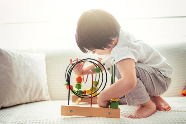 istock little boy playing with toys 1193986185