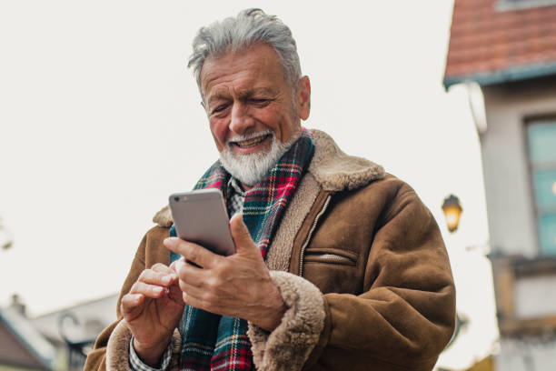 istock Portrait of a senior men using smart phone 1193986936