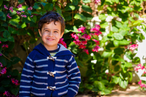 istock Cute boy outdoors 1193993999