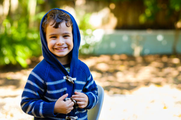 istock Cute boy outdoors 1193994083