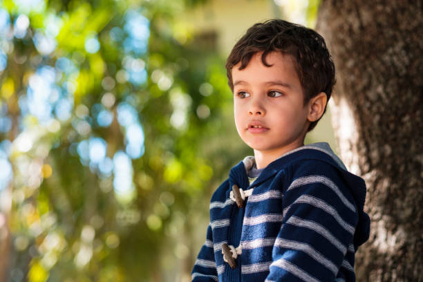 istock Cute boy outdoors 1193994127
