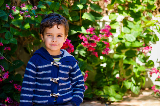 istock Cute boy outdoors 1193994156