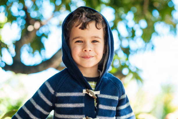 istock Cute boy outdoors 1193994166
