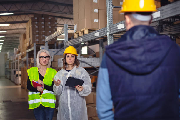 istock Warehouse workers at the factory 1193994857