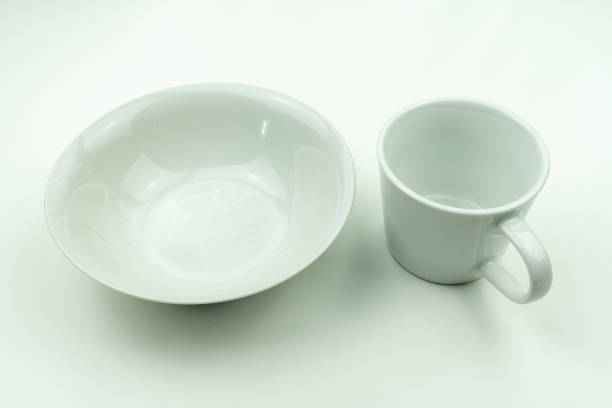 istock White dishes and silver cutlery 1193995927