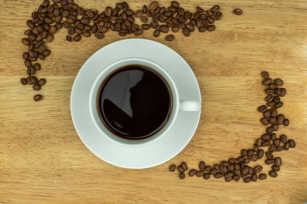 istock Wood, coffee cup and beans 1193996131
