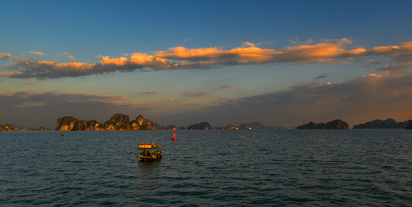 Hạ Long Bay (Vietnamese: Vịnh Hạ Long,  is a UNESCO World Heritage Site and popular travel destination in Quảng Ninh Province, Vietnam. The name Hạ Long means \