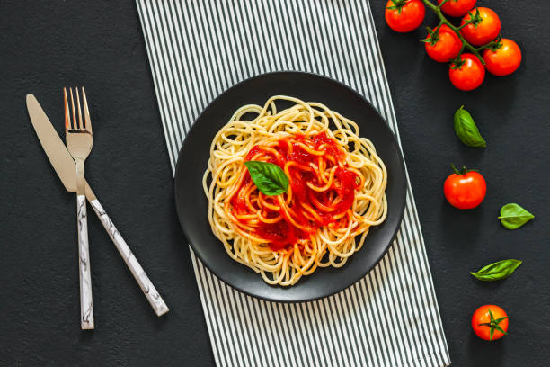 istock ?lassic italian spaghetti pasta with tomato sauce 1194012139