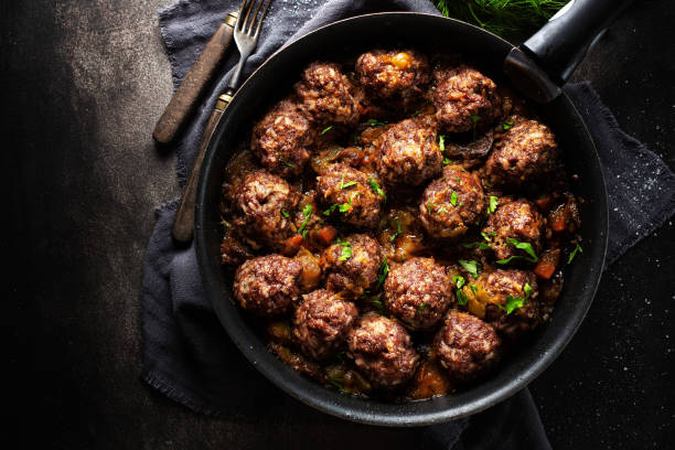 istock Fried meatballs with sauce on pan 1194016707