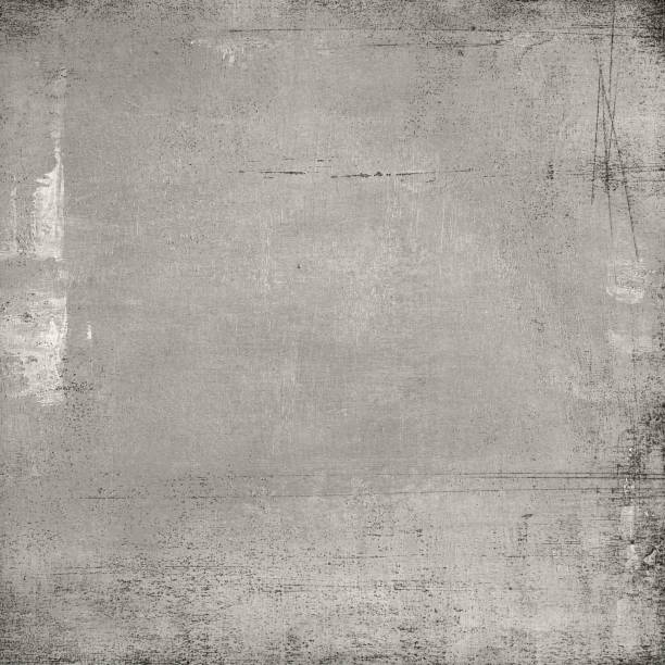 istock Old paper against grey textured background 1194025951