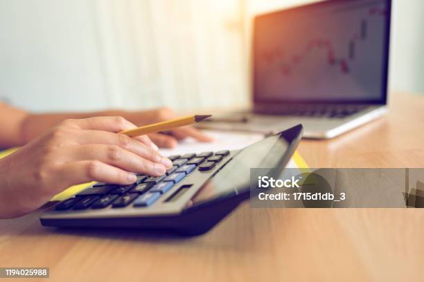 Womanworking Stock Photo - Download Image Now - Accountancy, Calculator, Modern