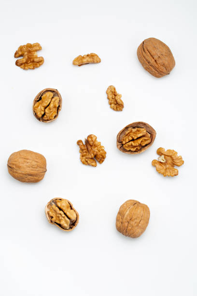 istock Walnuts isolated on white backgroun from top view. 1194031299