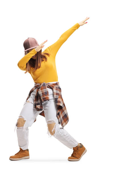 Female trendy teenager dabbing Female trendy teenager dabbing isolated on white background dab dance stock pictures, royalty-free photos & images