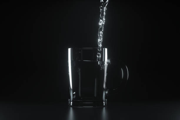 istock Pouring the water into the glass, dark background, 3d rendering. 1194038548
