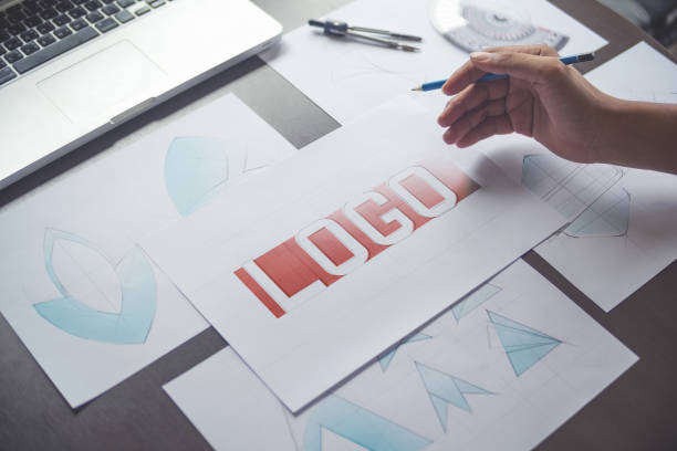 istock Graphic designer creative design sketch drawing logo Trademark brand Workspace 1194042998