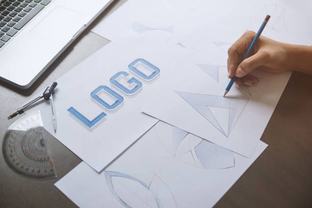 istock Graphic designer creative design sketch drawing logo Trademark brand Workspace 1194042999