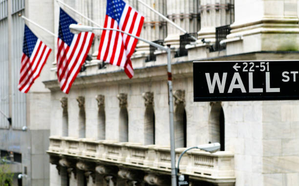 istock Flags and Wall Street Sign, NYC. 1194047075