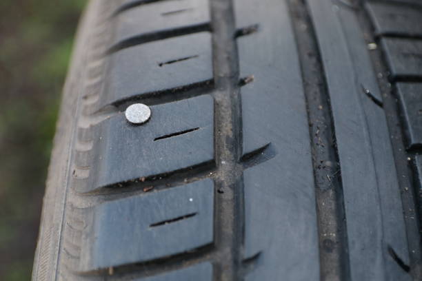 Nail Tire Stock Photos, Pictures & Royalty-Free Images - iStock