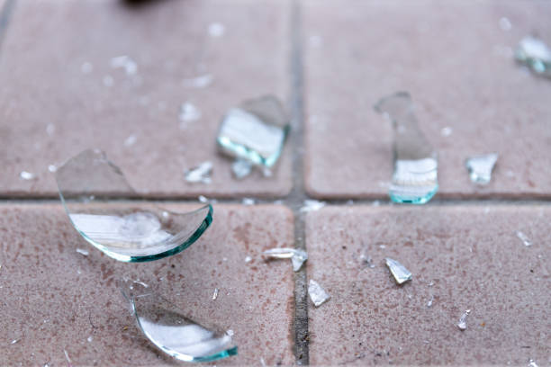 istock Broken glass on the floor, alcohol abuse 1194051090