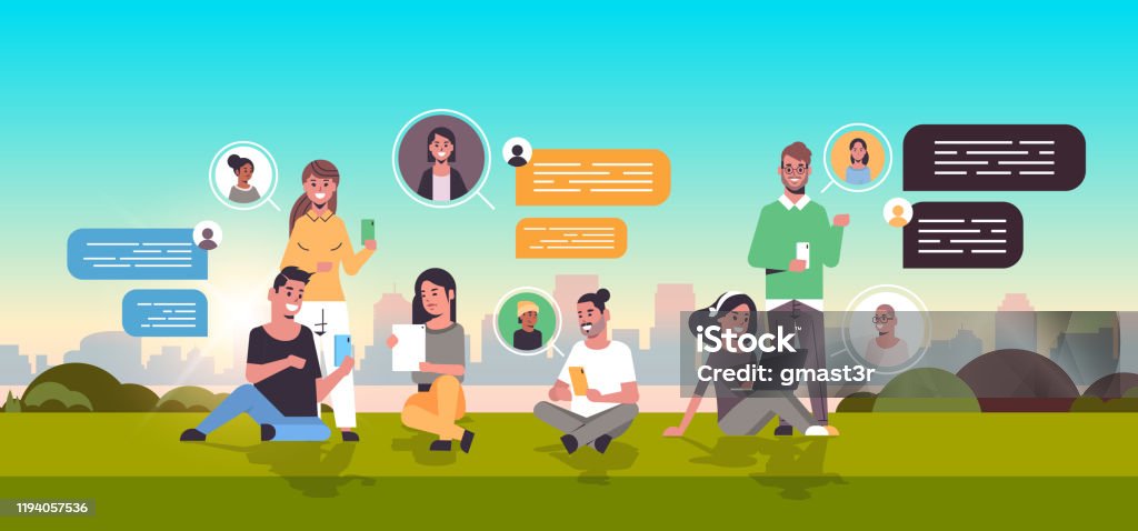 Chating Photo People Sitting On Grass Using Chatting App On Digital Devices Social ...