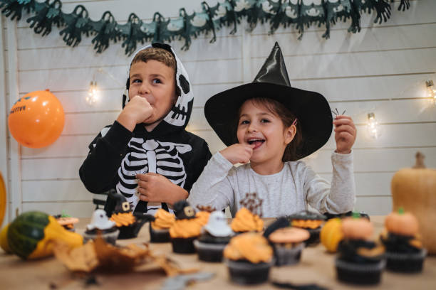 istock Siblings playing and bonding on Halloween 1194058368