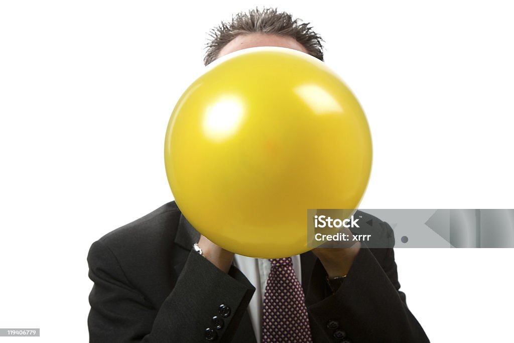 Di fronte a un uomo d'affari Mandare un palloncino - Foto stock royalty-free di Palloncino