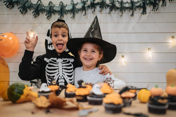 istock Cute brother and sister Halloween celebration 1194072770
