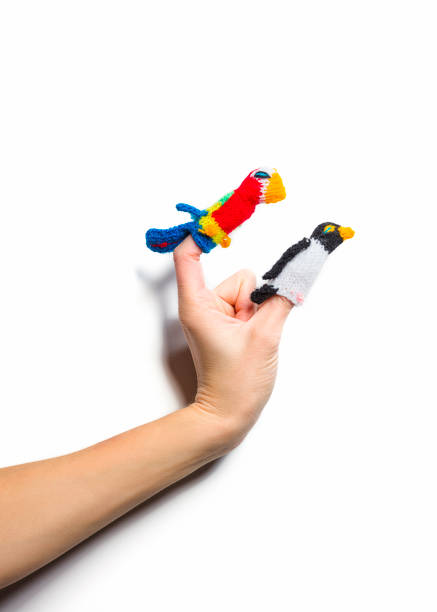 istock finger puppets on white background 1194076864