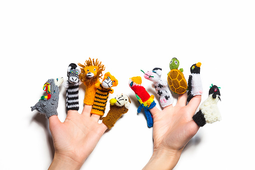 hand with toys