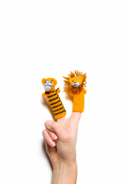finger puppets on white background hand with toys punch puppet stock pictures, royalty-free photos & images
