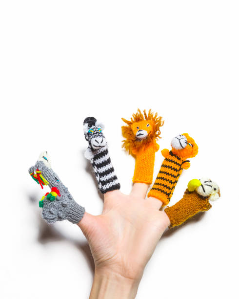 istock finger puppets on white background 1194076924