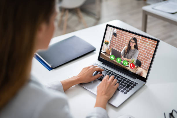 istock Businesswoman Using Laptop At Desk 1194076952