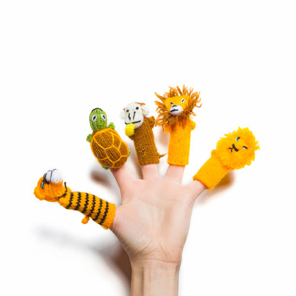 istock finger puppets on white background 1194076963