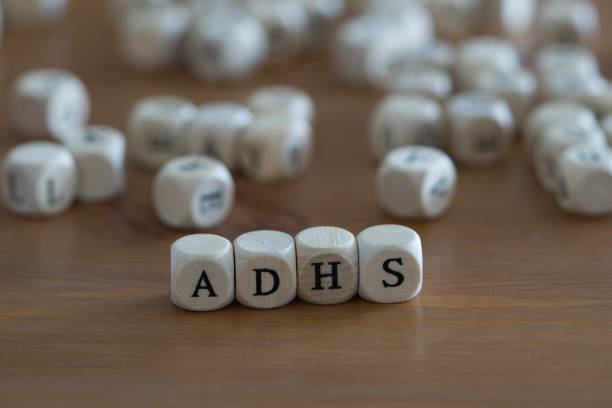istock adhs with wooden cubes written in german 1194077053