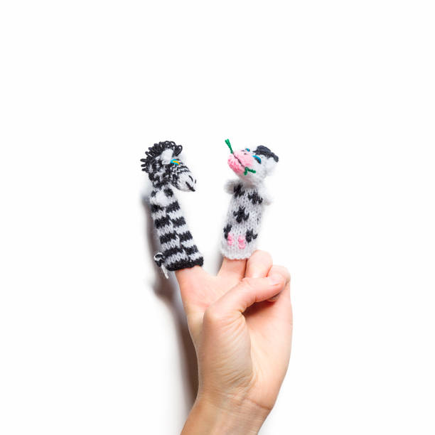 istock finger puppets on white background 1194077059