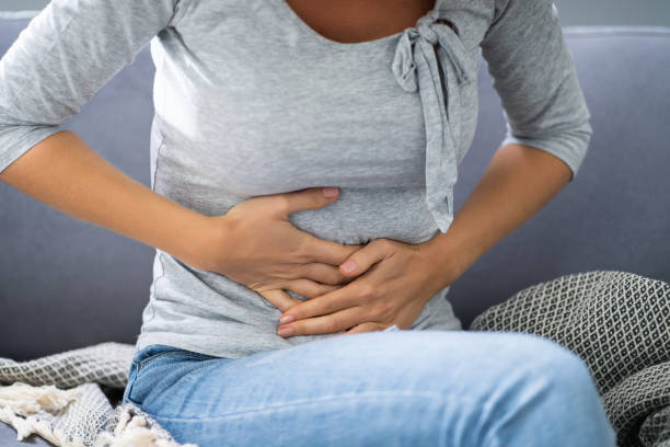 istock Woman With Stomach Ache 1194077350