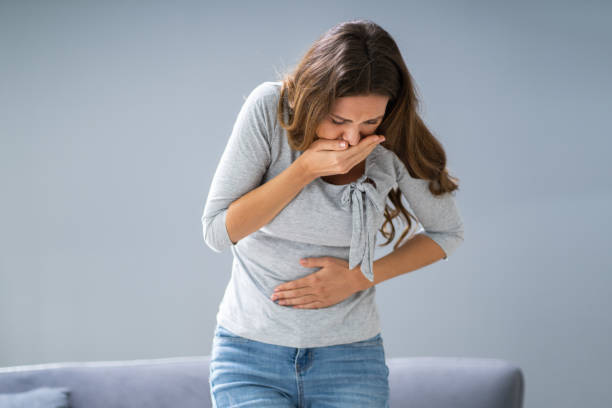 istock Young Pregnant Woman Suffering From Nausea 1194077352