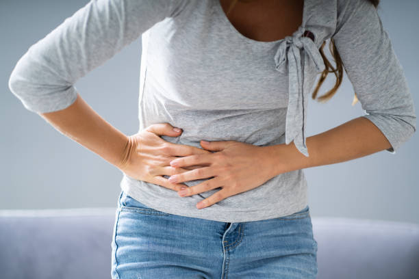 istock Woman With Stomach Ache 1194077362