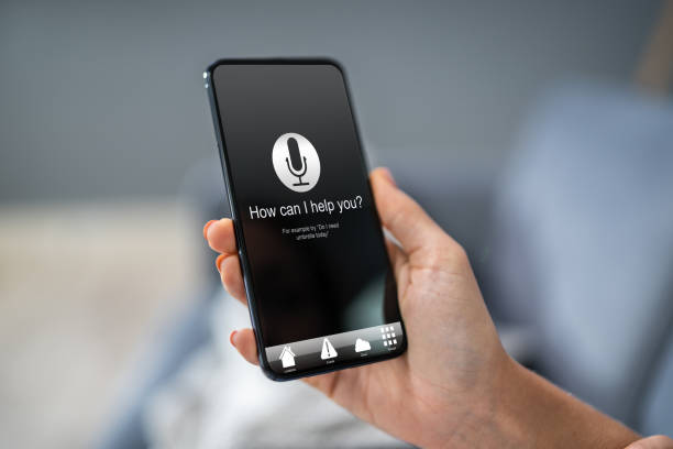 istock Woman Holding Smart Phone With How Can I Help You? 1194078017