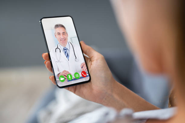 istock Person Videochatting With Doctor 1194078034