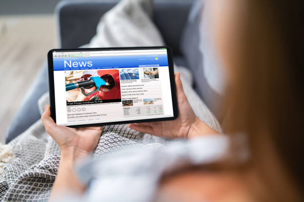istock Person Watching News On Digital Tablet 1194078555