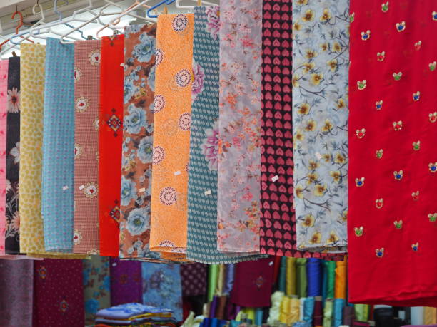 istock Scarfes and clothes at Muscat Souk 1194080199