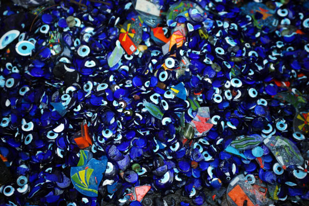 istock scrap glass pieces and evil eye beads 1194085018