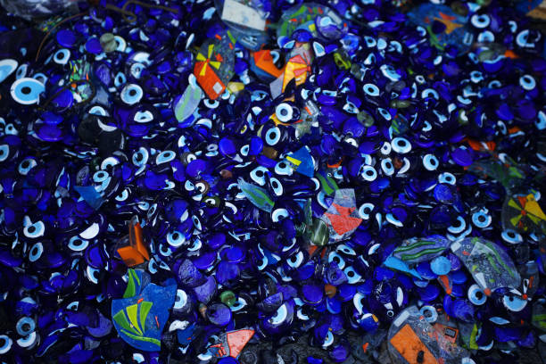 istock scrap glass pieces and evil eye beads 1194085032