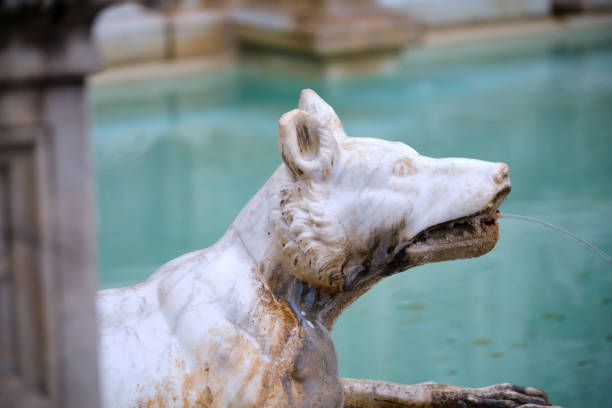 istock Bas relief from public fountain in Piazza del Campo, Siena 1194085818