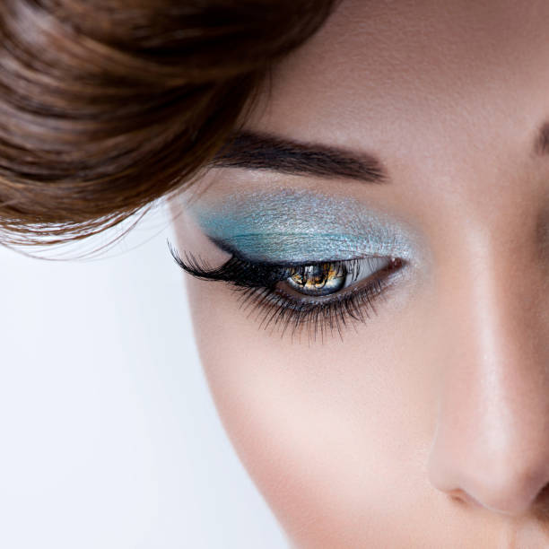 istock Woman's eye with blue eye makeup 1194086374