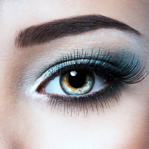 istock Woman's eye with blue eye makeup 1194086397