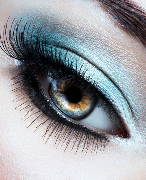 istock Woman's eye with blue eye makeup 1194086398